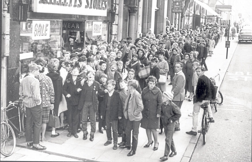 1964: People queue outside Millet’s store in Union Street for the start of their sale