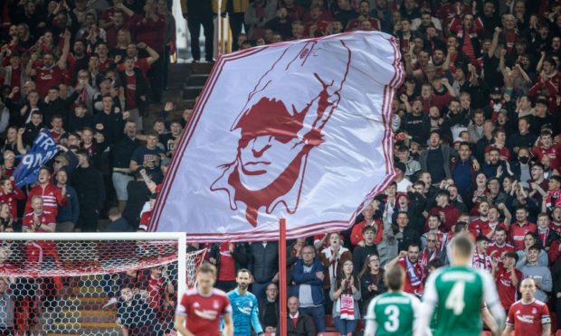 Aberdeen fans in the Red Shed during the Europa Conference League match between Aberdeen and Breidablik.