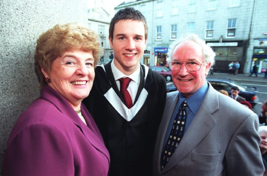 Bachelor of Science in Mathematics and Computing, from Robert Gordon University, Gordon Shepherd (21) from Aberdeen with mum Esma and dad Robbie Shepherd, outside Aberdeen's Music Hall.