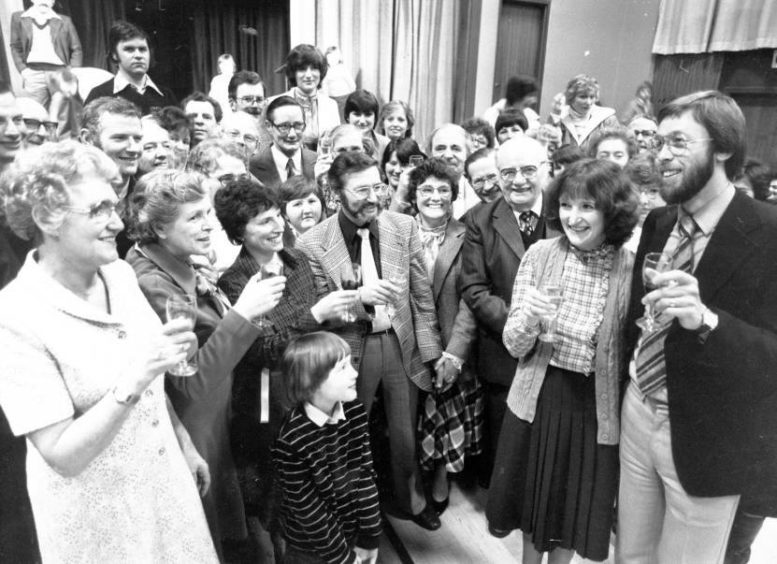 1982: The new principal officer for the Aberdeen and North-east Society for the Deaf, Peter Collins, right, and his wife Susan are welcomed at a cheese and wine party at the Centre for the Deaf, Smithfield Road, Aberdeen.