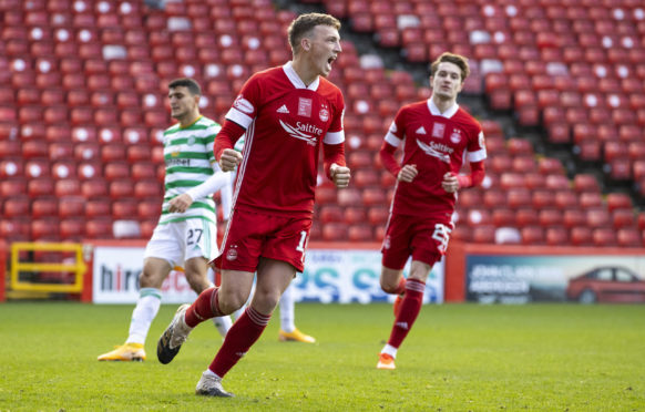 Lewis Ferguson celebrates scoring from the penalty spot to make it 3-3 against Celtic in October.