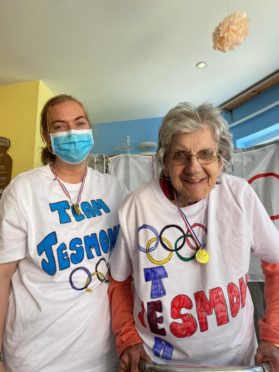 87-year-old Elsie Connell packs the punches with Lee McAllister at Jesmond Care Home.