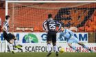 Aberdeen target Jamie McGrath nets a penalty against Dundee United.