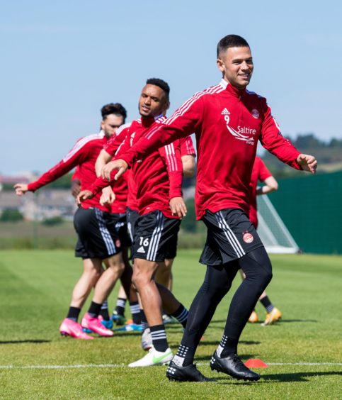 New signing Christian Ramirez (R) during an Aberdeen training session at Cormack Park.