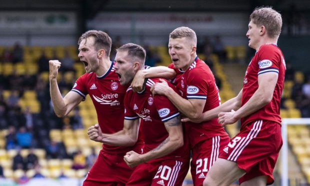 Aberdeen's Teddy Jenks celebrates his equaliser during a cinch Premiership match at Livingston.