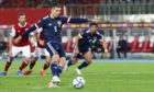 Scotland's Lyndon Dykes makes it 1-0 from the penalty spot against Austria in the World Cup qualifier.