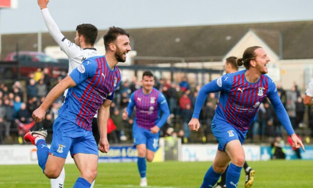 Sean Welsh (left) celebrates making it 1-0 to ICT.