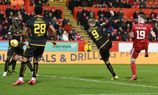 Motherwell's Kevin van veen makes it 2-0 against Aberdeen at Pittodrie in November.
