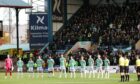 The Celtic players observe a minute silence during the Premiership match between Dundee and Celtic at the Kilmac Stadium at Dens Park, on November 07, 2021, in Dundee, Scotland. (Photo by Alan Harvey / SNS Group)