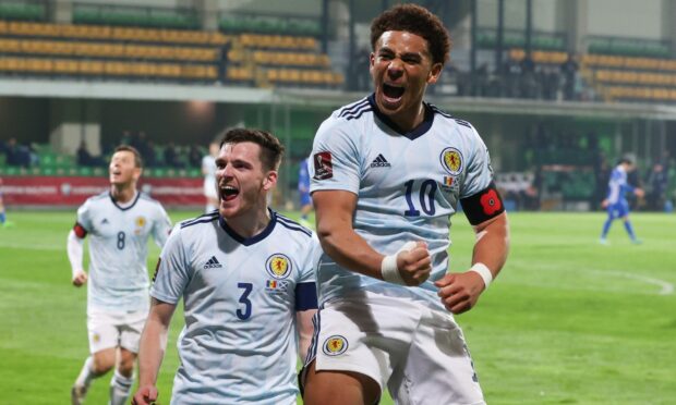 Scotland striker Che Adams celebrates scoring to make it 2-0 against Moldova