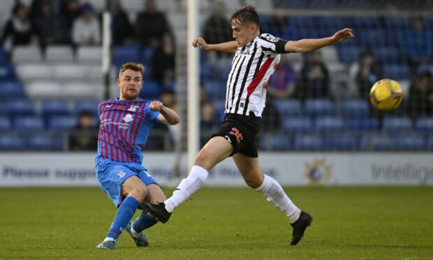 Dunfermline's Matty Todd and Inverness' Lewis Jamieson in the thick of the action.