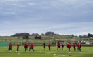 The Aberdeen players training at Cormack Park.