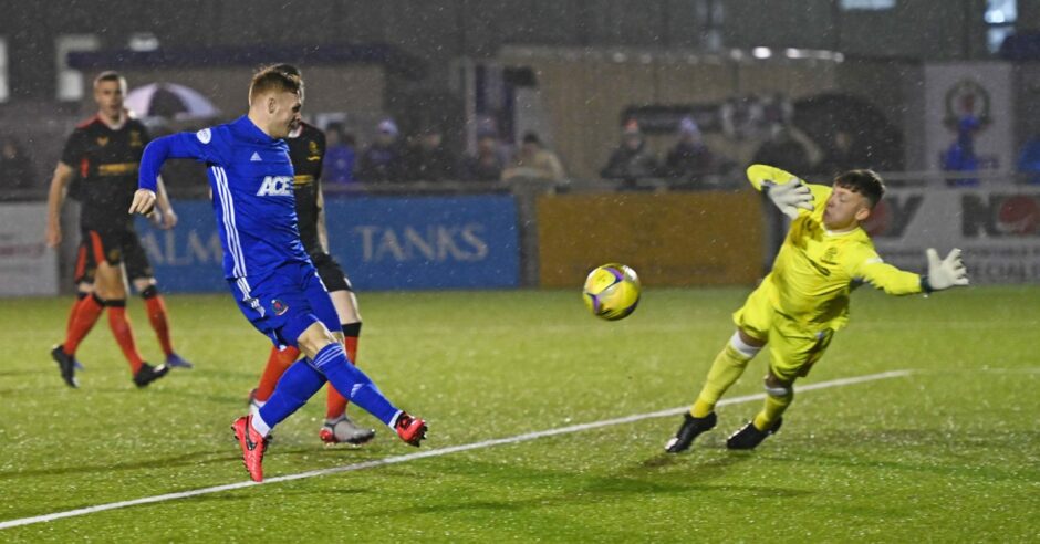 Fraser Fyvie turns in the opener for Cove Rangers