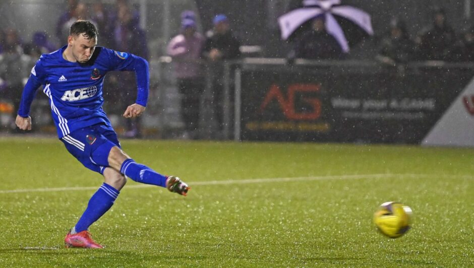 Mitch Megginson tucks away his penalty against Rangers B