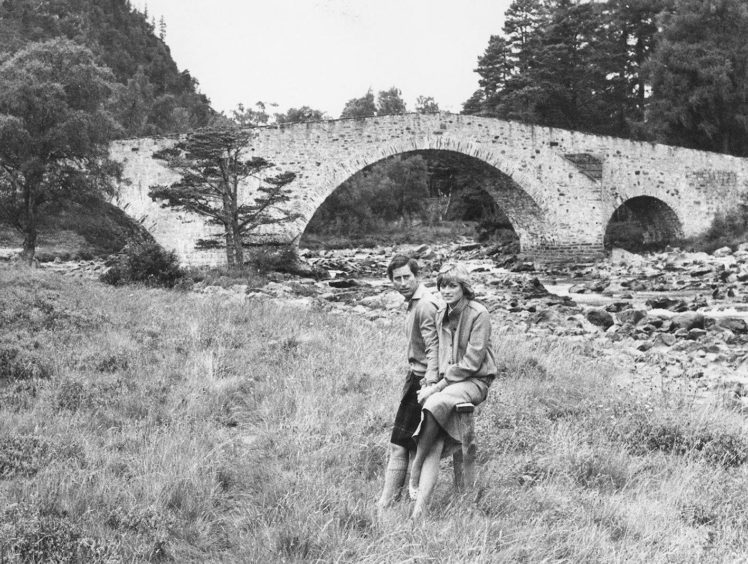 1981: The Prince and Princess of Wales on the bank of the River Dee near the old Brig o' Dee at Invercauld to record the first official public interview since their marriage three weeks before.
