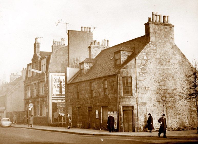 1961: The Holburn Bar was originally housed in the ground floor of the left-hand building, before it moved to its new premises when the old house on the corner of Holburn Street and Fonthill Road was demolished.