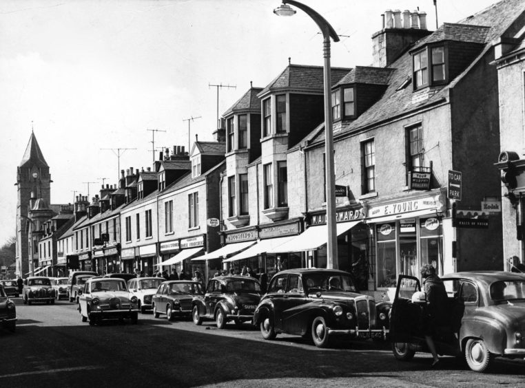 1966: Cars line Banchory's High Street and shoppers throng the pavement in April 1966. At the time it was claimed that Banchory had one of the healthiest economies in Scotland.
