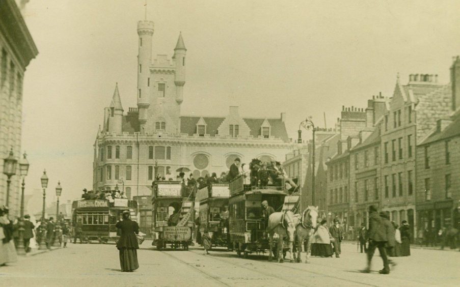 Horse-drawn tram cars line up Aberdeen's Castlegate in this picture believed to be from around the late 1890s. The advertisement on the front of the back three trams is for Sunlight soap.