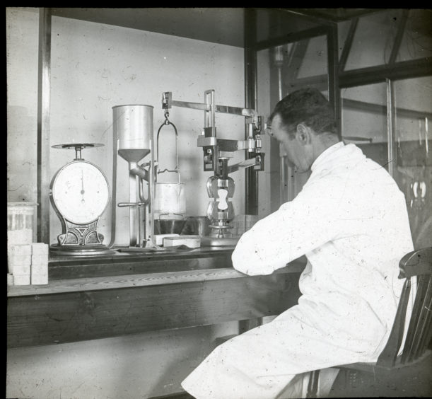 Scicentist working in laboratory at Matthews Quay