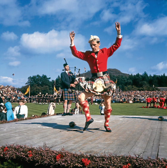 1970: A competitor in the Highland dancing competition at the Braemar Gathering.
