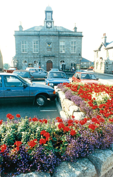 1990: Despite changes to the car park, Meldrum Square is virtually unchanged from this picture.