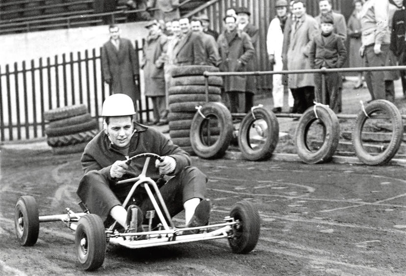 1960: Fergus Robertson does his first lap in public in the go-kart test track at Linksfield Stadium, Aberdeen.