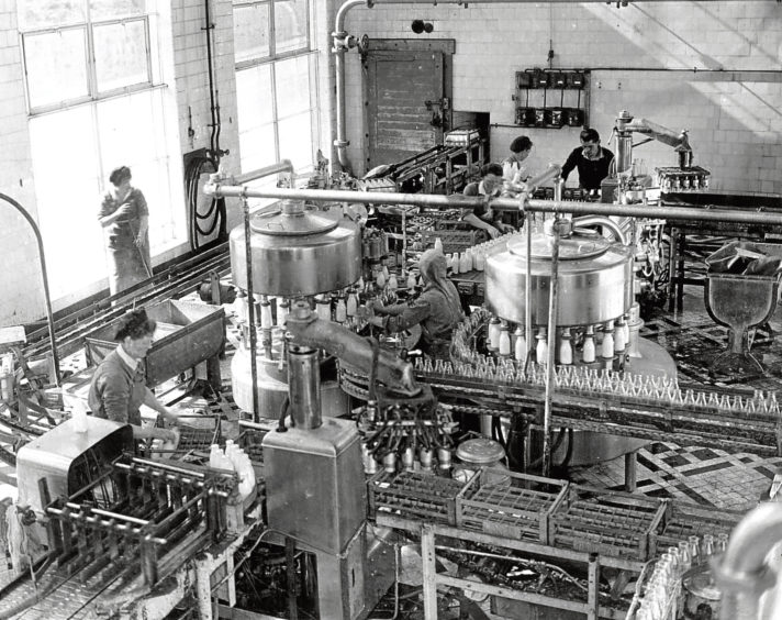 1961: The Northern Co-operative Society dairy, filling the bottles.