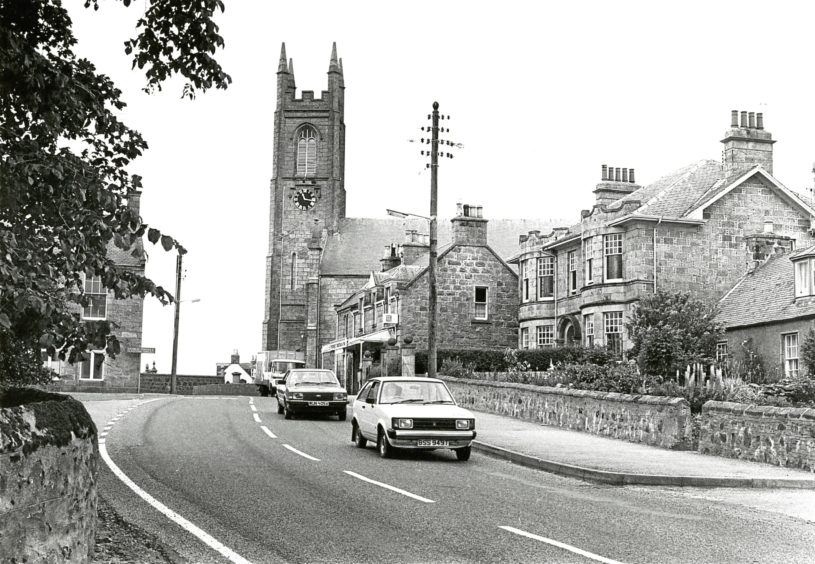 1980: A view of Church Crescent in New Deer, taken from Fordyce Terrace and showing St Kane's Church in 1980.