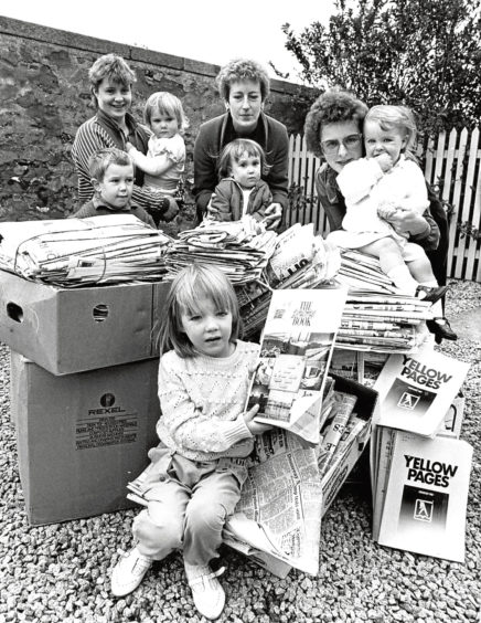 1988: Members of New Deer Mother and Toddlers Group with some of the five tons of paper and cardboard they have collected over the past few months to sell for funds for the group.