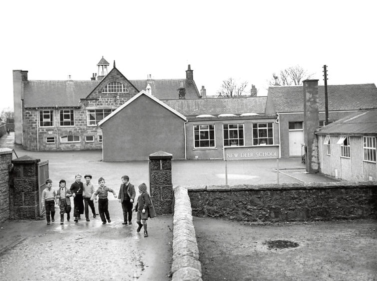 1963: New Deer school with some of its pupils exiting through the gates