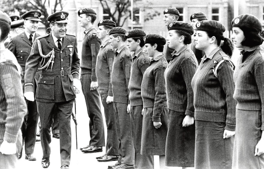1989: Air Commodore Peter Naz inspecting cadets of the Aberdeen Airport and Turriff squadrons.