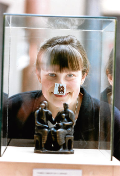 1993: Alison Brown, assistant keeper of fine art, with one of the stamps showing Henry Moore’s work.