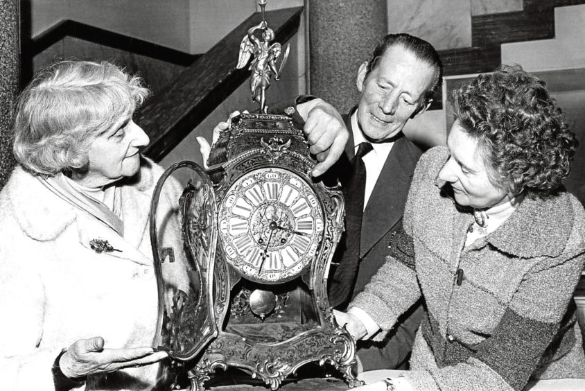 1979: Frank Philip shows visitors the 18th century French clock which stood in the gallery’s foyer.
