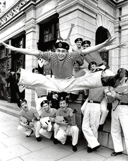 1989: Igor Zhuk gets off to a flying start with the cast from the Red Navy outside His Majesty’s Theatre.