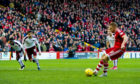 Aberdeen's Adam Rooney opens the scoring from the penalty spot.