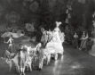 1955:  Coach and horses carry Cinderella to the ball.