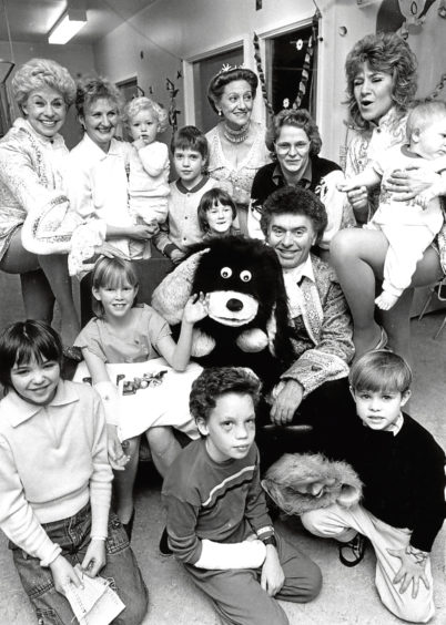1987:Cast members of Cinderella pay a visit to the children at Royal Aberdeen Children’s Hospital
