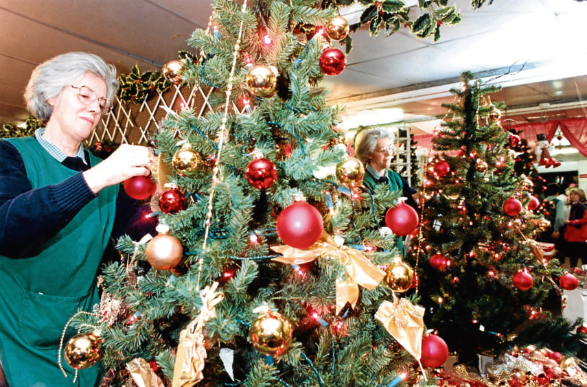 1991: Shop assistant Joan Milne creating one of the many festive displays on show at Hazlehead garden centre.