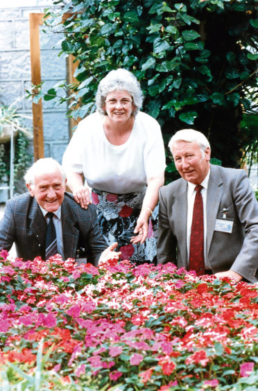 1992: Admiring the flowers are Beautiful Scotland in Bloom co-ordinator May Wright and horticulturalists Jimmy Murdie and Jim Fairlie.
