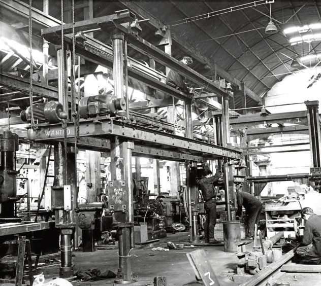 1967: A granite wire saw and a granite swing under construction at Cassies, Aberdeen.