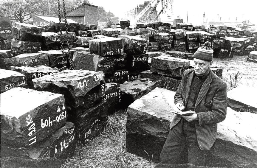 1980: A large consignment of black Swedish granite is checked by Henry Thompson, at Granite Supply Association’s yard in Urquhart Road, Aberdeen.