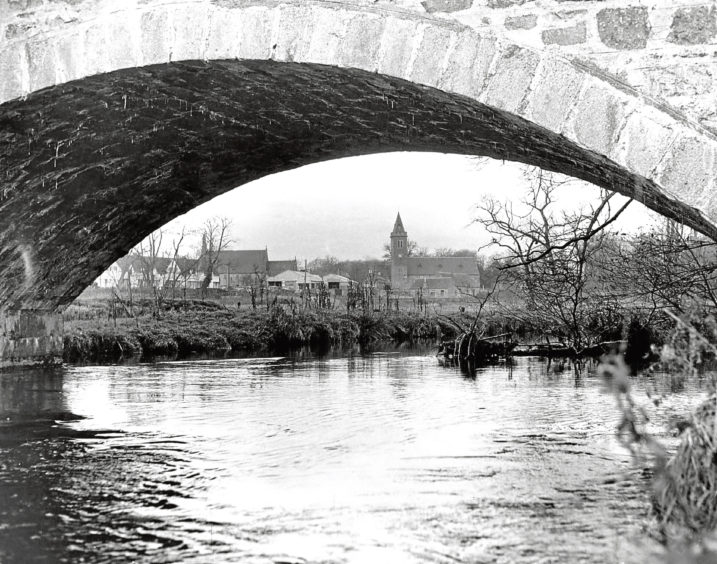 1962: Old Deer as seen through the bridge that crosses the South Ugie Water.