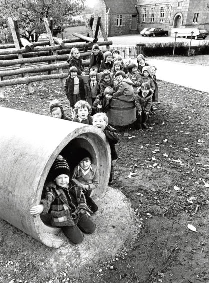 1980: Torphins Primary 1 pupils make the most of the new play area built by members of the parent-teacher association.