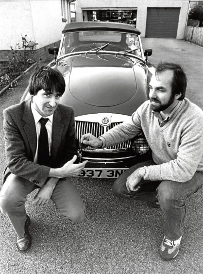 1983: Raffle winner Ricky Stuart receives the keys for a ‘59 MGA roadster worth £4,000 courtesy of a 50p ticket.