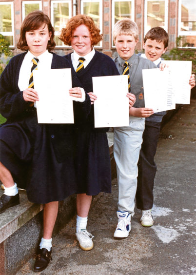 1991: from left, Gillian Moir, Emma Anderson, Ray Brown and Matthew Ingham, of Balmedie Primary, display silver certificates for their science projects.