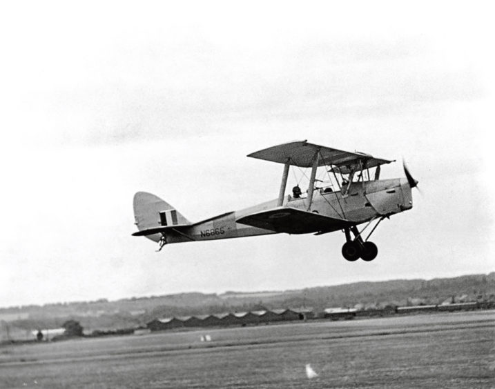1952: Tiger Moth takes off giving a cadet a flip – a quick tour or pleasure trip – during the Air Training Corps Summer Camp at Dyce.