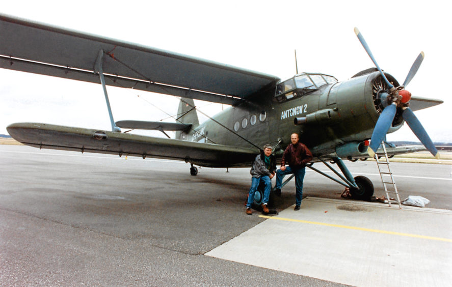 1992: German pilots Soenke Claussen, left, and Volker Stegemann with their Russian Antonov 2 bi-plane in Aberdeen, en route to Venezuela