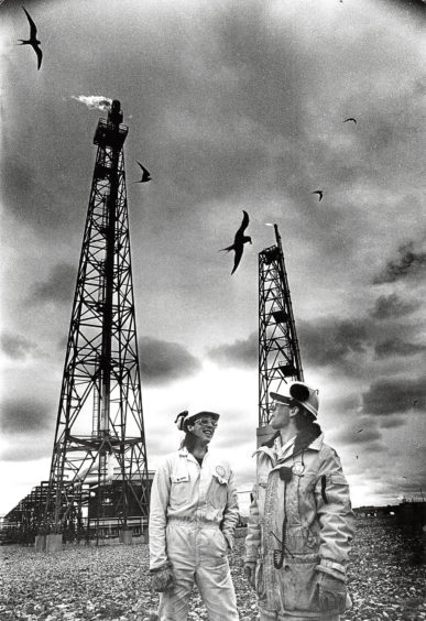 1987: Gas terminal staff Dave Murdoch and Colin West need their headgear to protect them from terns.