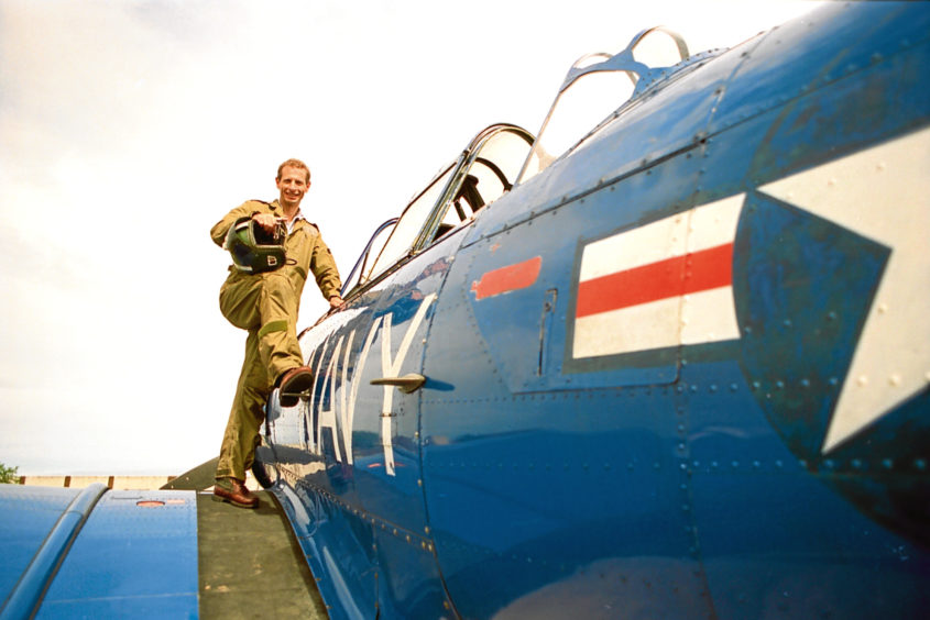 1996: Pilot Clive Davidson with the North American T6 Harvard training plane, which was based at Aberdeen Flying Club.