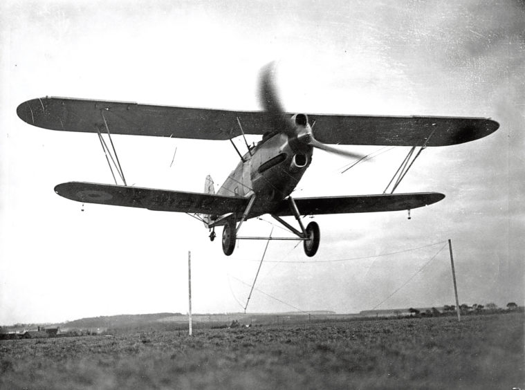 1930s: A Hawker Hector, which was used to pick up and deliver messages.